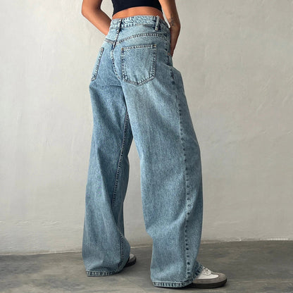 Le Dominé — High-Rise Fluid Wide Denim