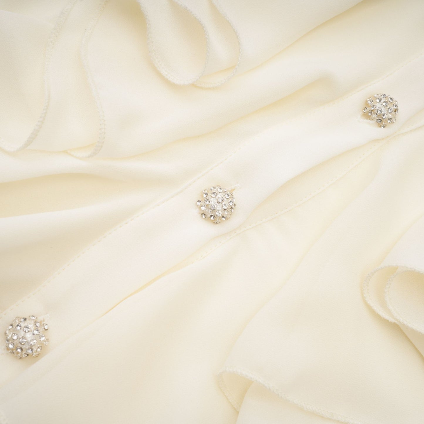 La Rêverie Éclat — Ruffled pearl and crystal blouse