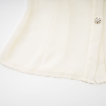 La Rêverie Éclat — Ruffled pearl and crystal blouse