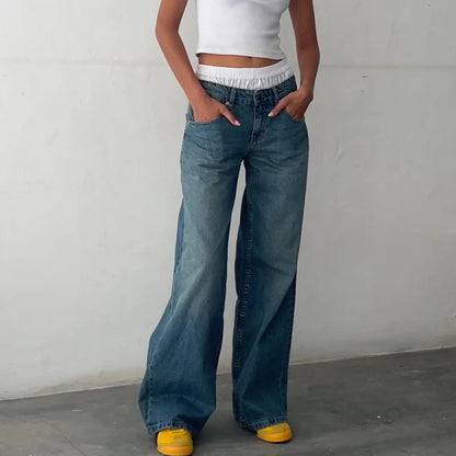 Le Dominé — High-Rise Fluid Wide Denim