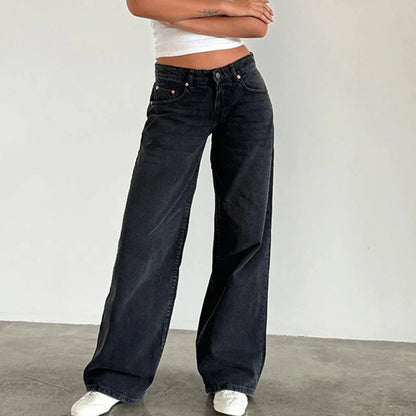 Le Dominé — High-Rise Fluid Wide Denim