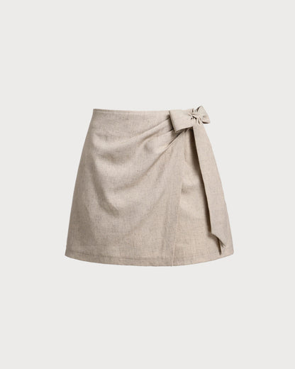 La Solenne — Textured wrap mini skirt