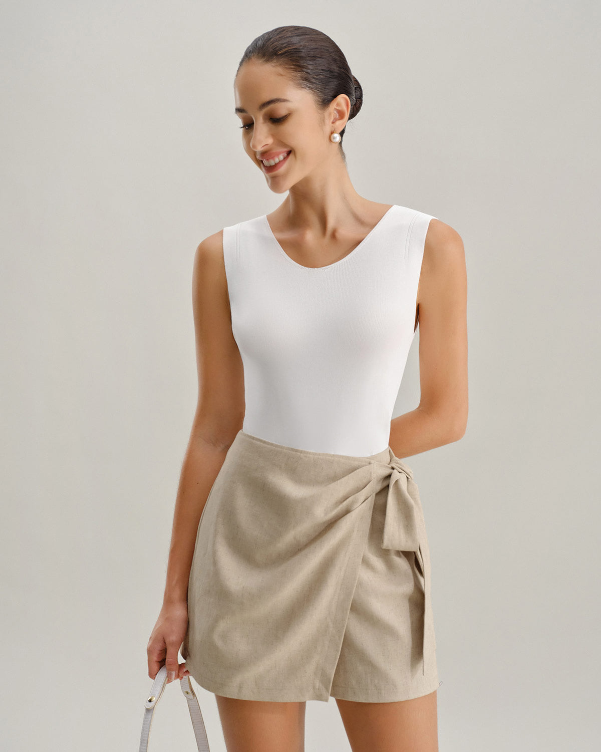 La Solenne — Textured wrap mini skirt